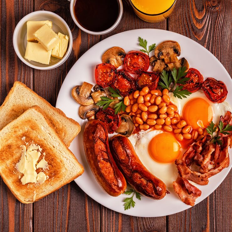 traditional-full-english-breakfast-with-fried-eggs-sausages-beans-mushrooms-grilled-tomatoes-bacon-wooden-background_266870-8328 (2)