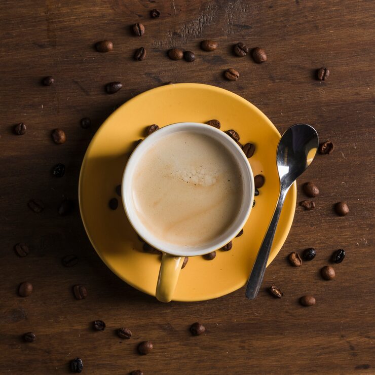 yellow-cup-with-beverage-near-coffee-beans_23-2148180237 (2)
